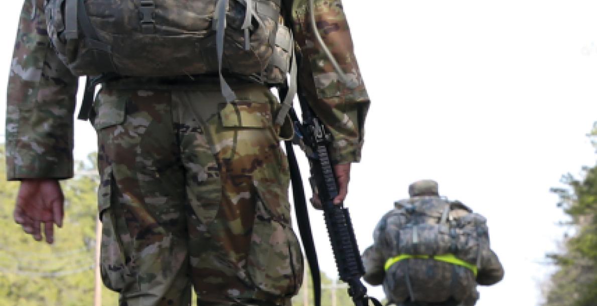Army National Guard soldiers conduct a 12-mile road march during a competition at Joint Base McGuire-Dix-Lakehurst, New Jersey.